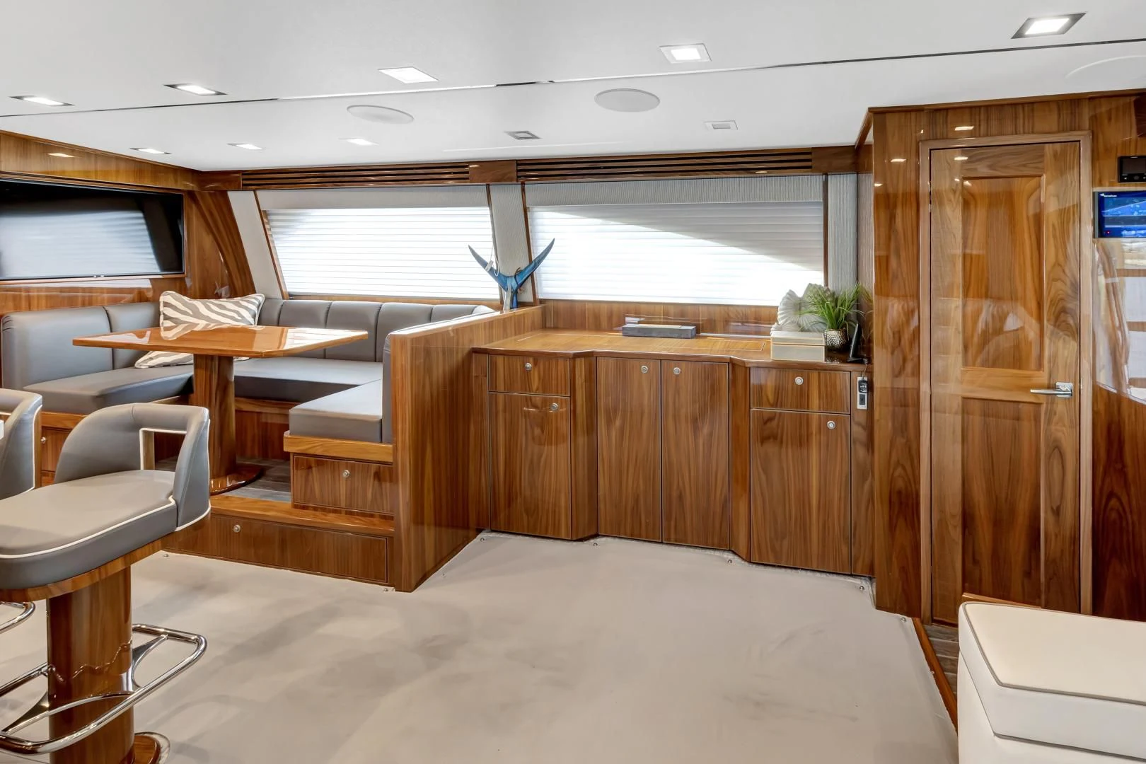 a room with a desk and chairs aboard POZO SECO Yacht for Sale