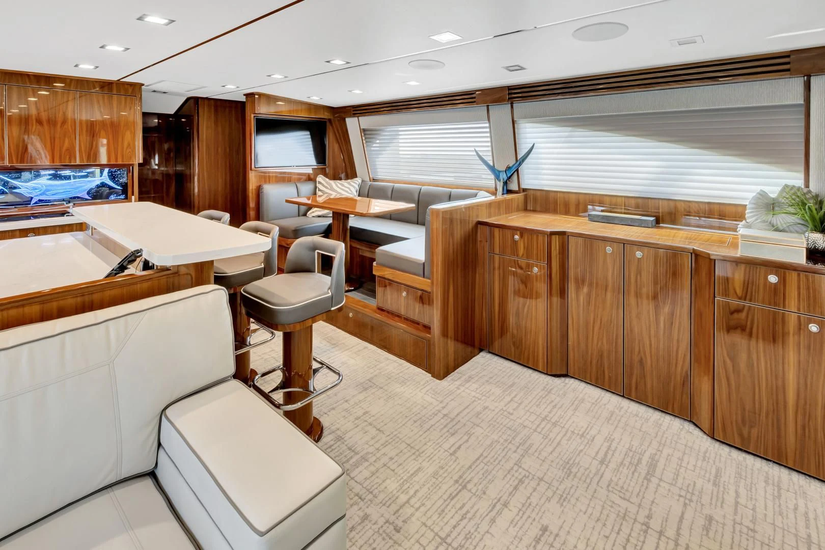 a room with a desk and chairs aboard POZO SECO Yacht for Sale
