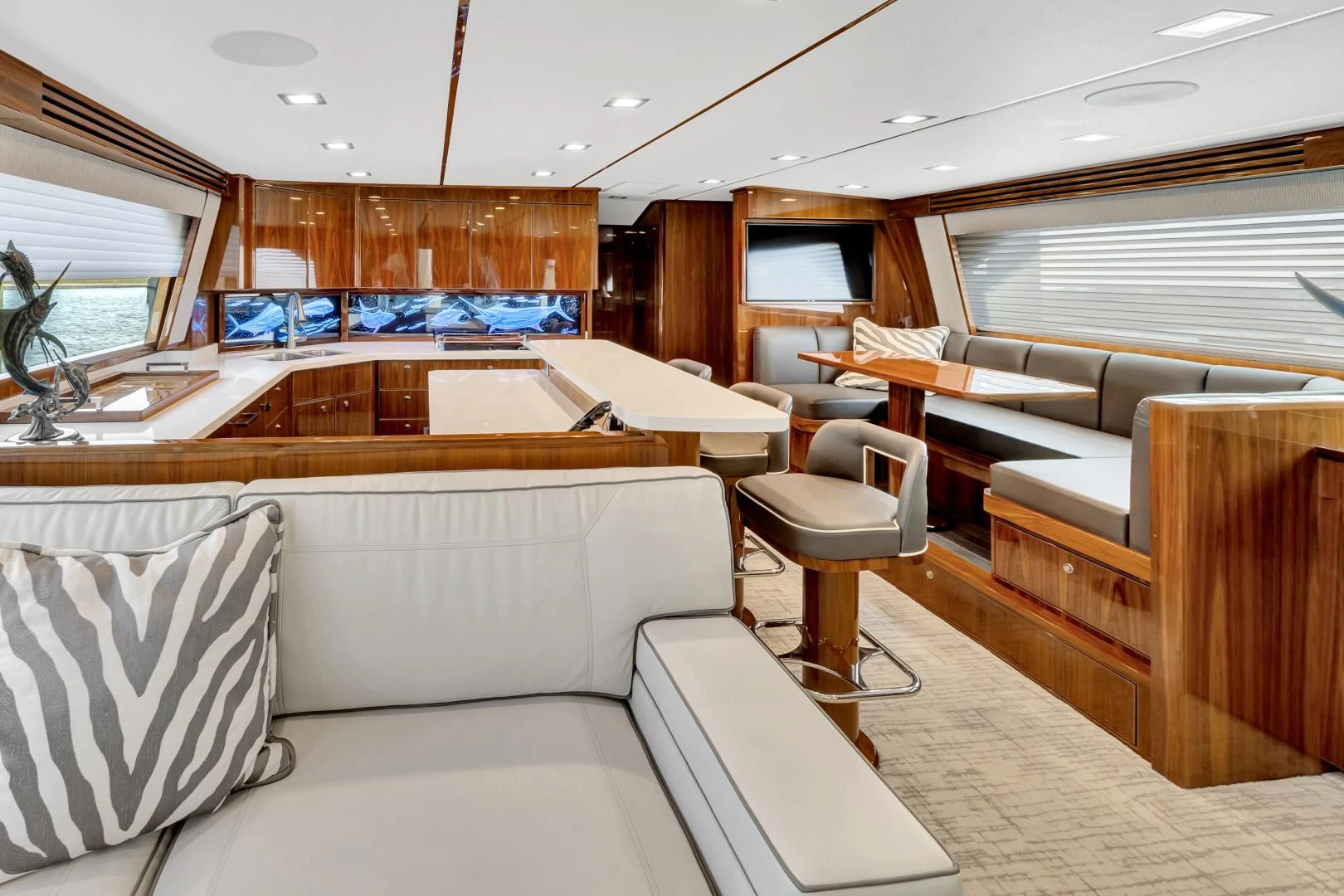 a large room with a couch and a table aboard POZO SECO Yacht for Sale