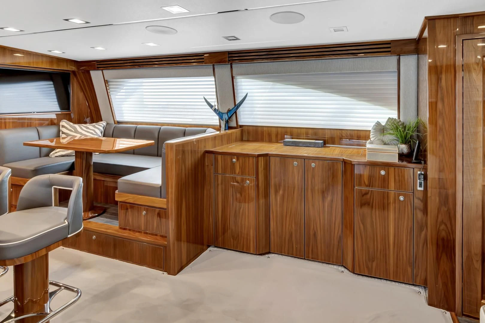 a room with a desk and chairs aboard POZO SECO Yacht for Sale