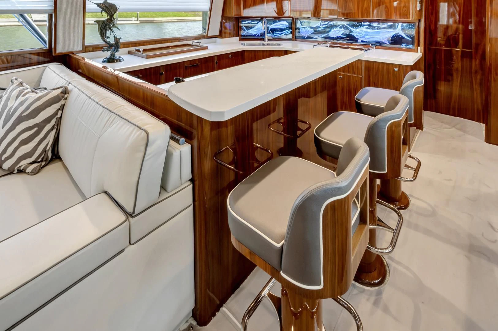 a white chair next to a table aboard POZO SECO Yacht for Sale