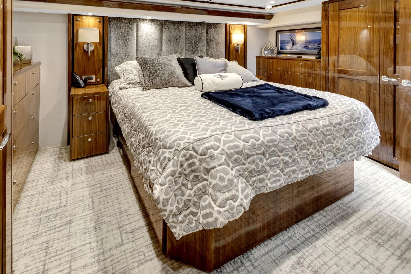 a bed with a white comforter aboard POZO SECO Yacht for Sale