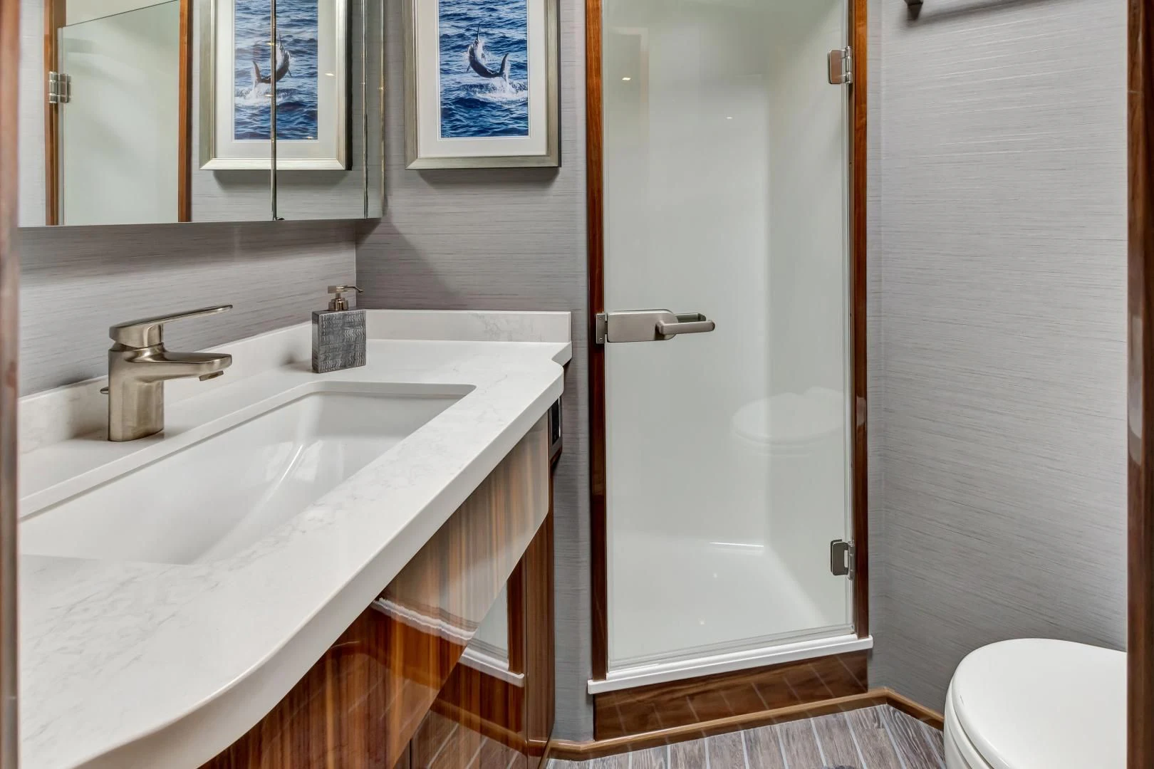 a bathroom with a sink and a toilet aboard POZO SECO Yacht for Sale