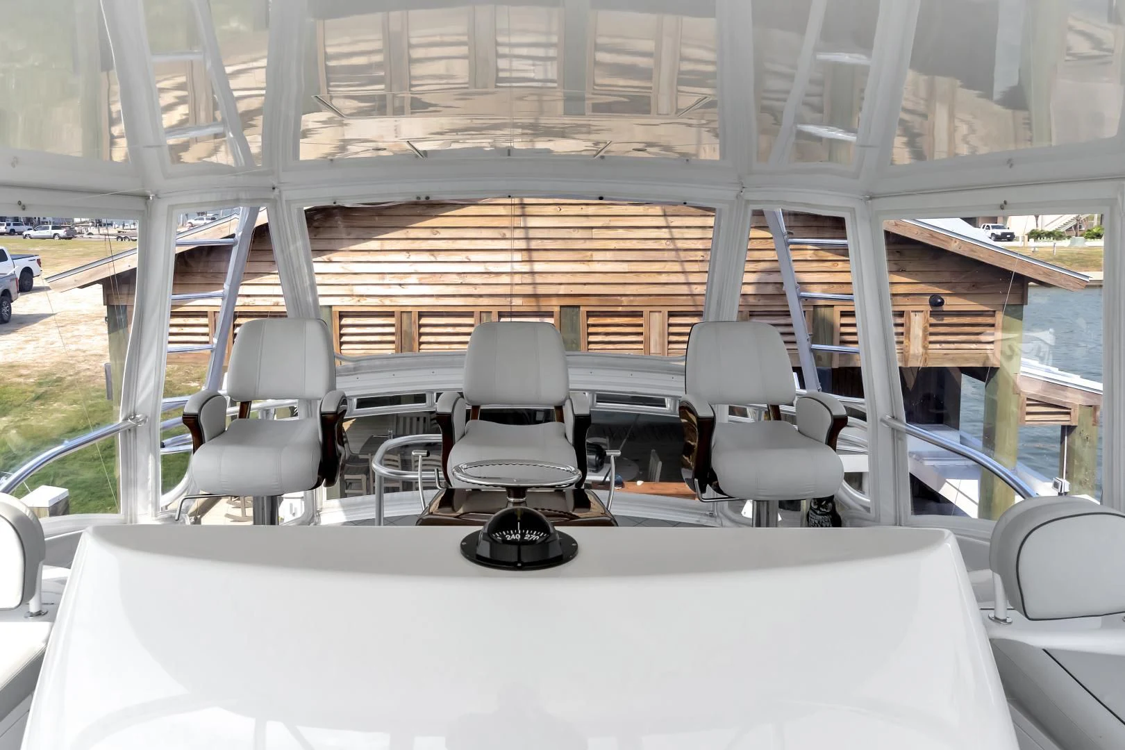 a room with chairs and a table aboard POZO SECO Yacht for Sale