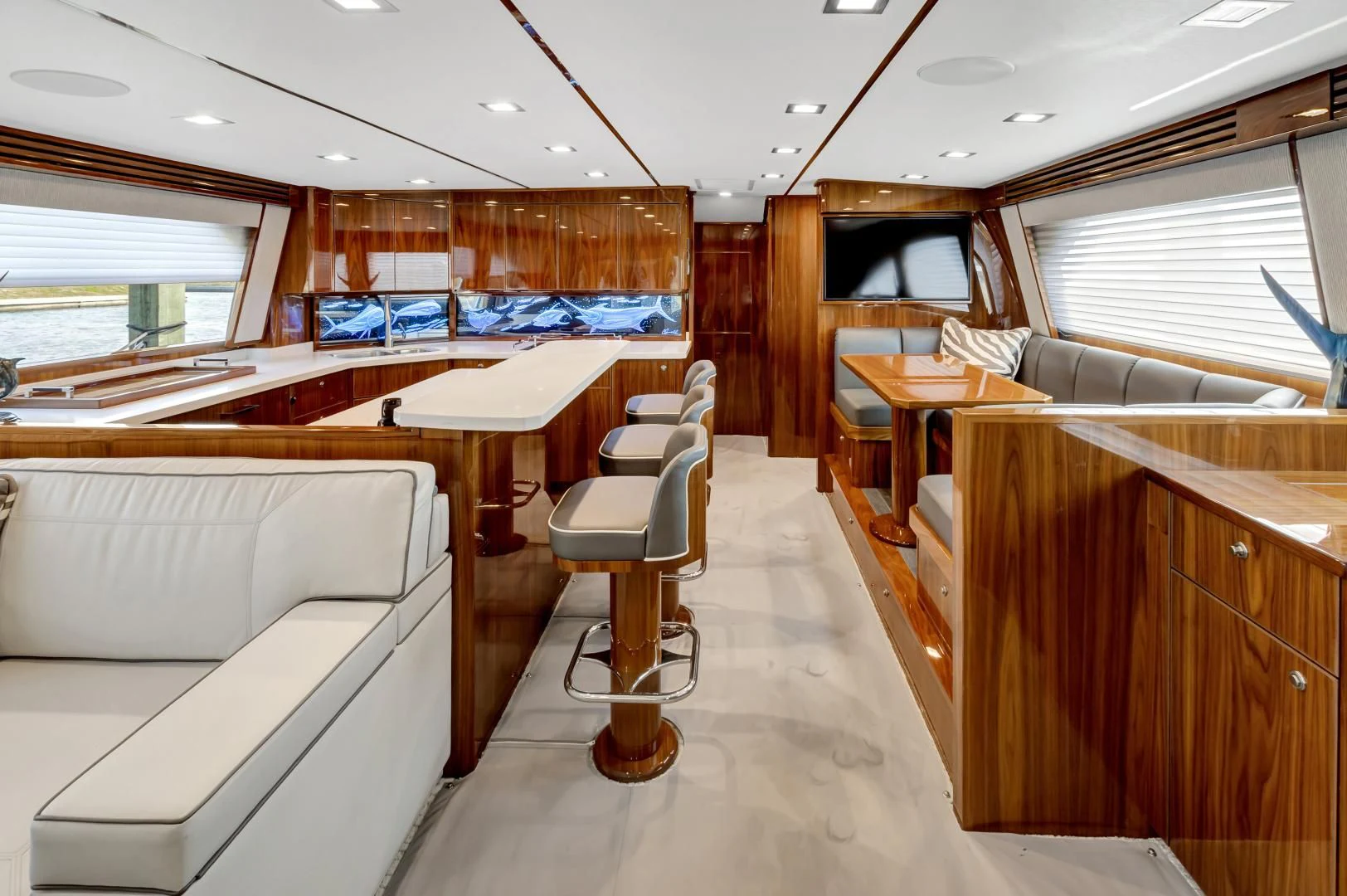 a room with a couch and a table aboard POZO SECO Yacht for Sale