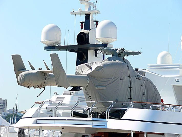 a large military aircraft on a boat aboard ATHINA III Yacht for Sale