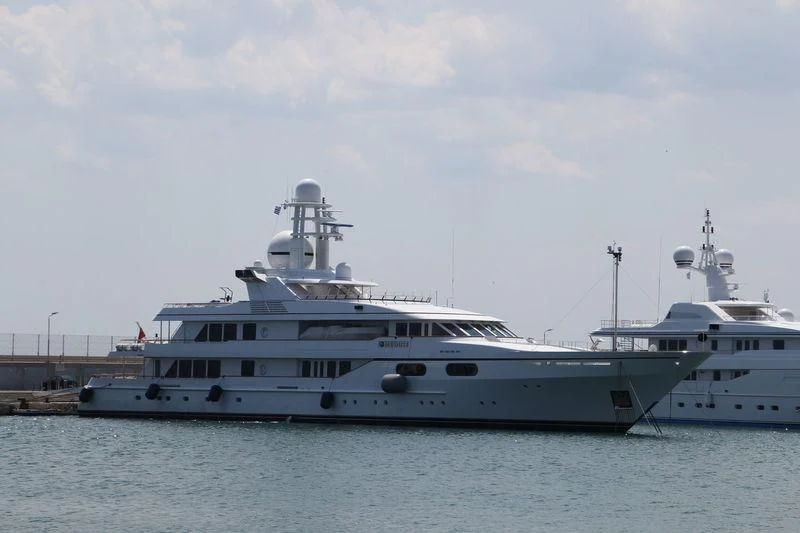 a couple of large white boats aboard ATHINA III Yacht for Sale