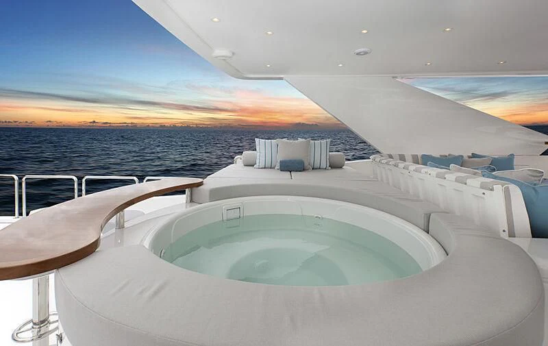 a large white swimming pool aboard PINGUINITO Yacht for Sale