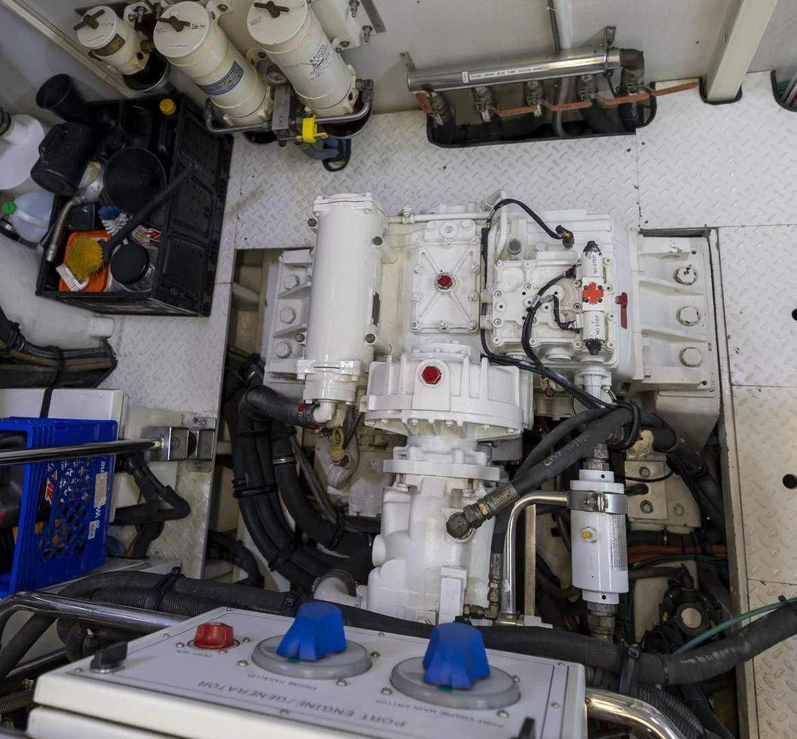 a machine with a blue cap aboard PINGUINITO Yacht for Sale