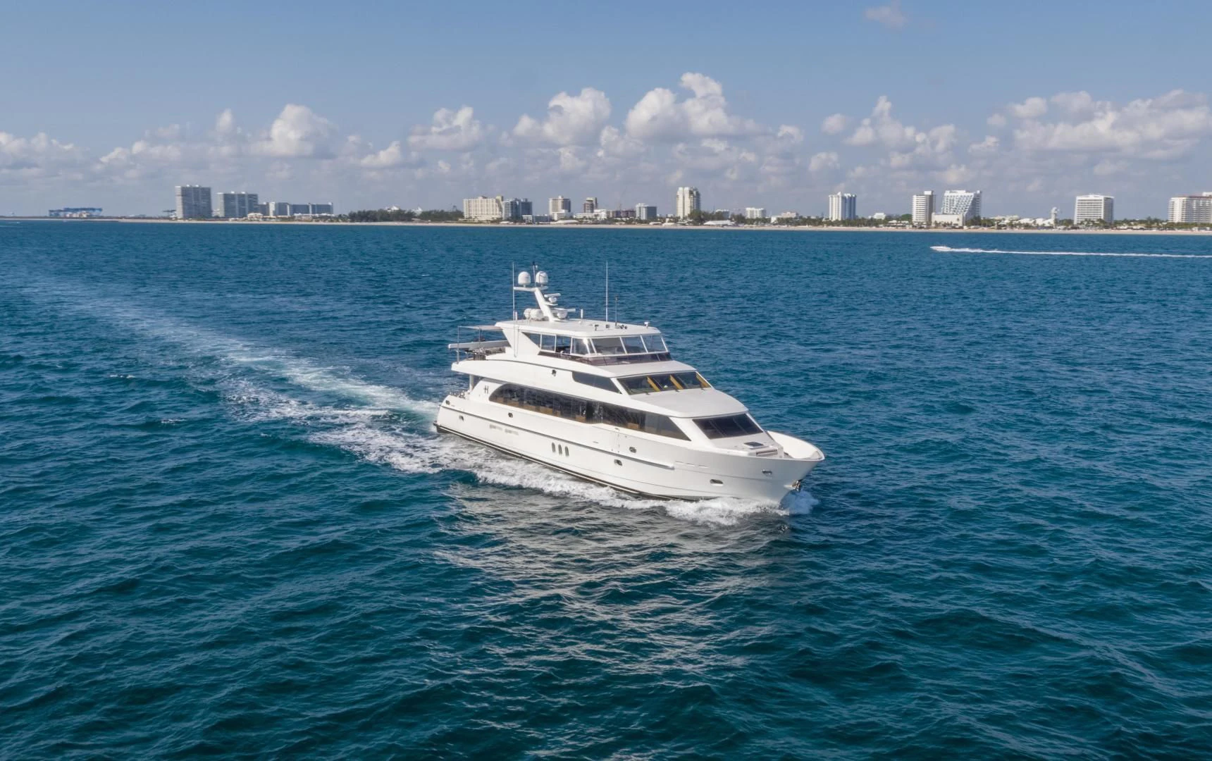 a white yacht on the water aboard PINGUINITO Yacht for Sale