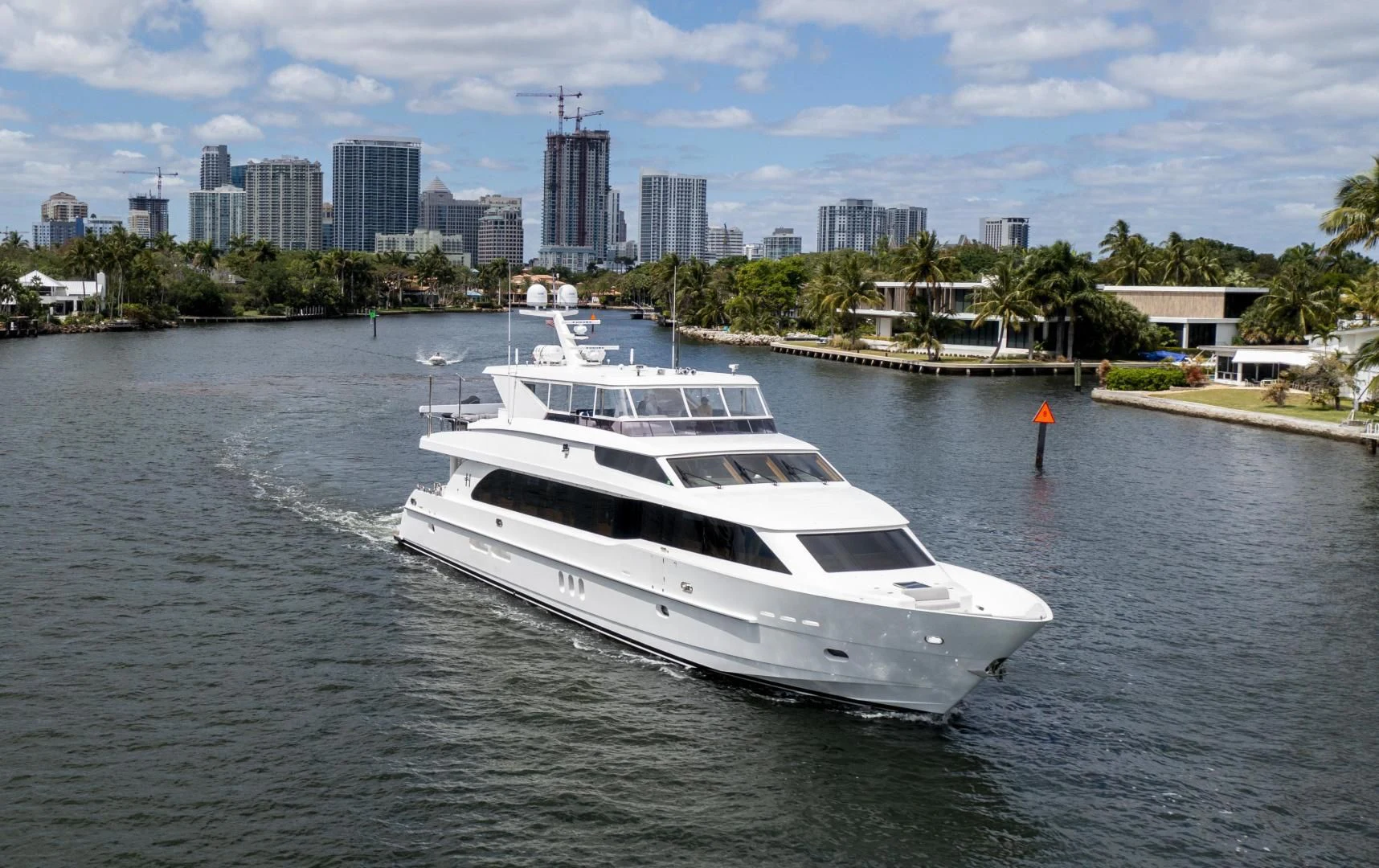 a white boat in the water aboard PINGUINITO Yacht for Sale
