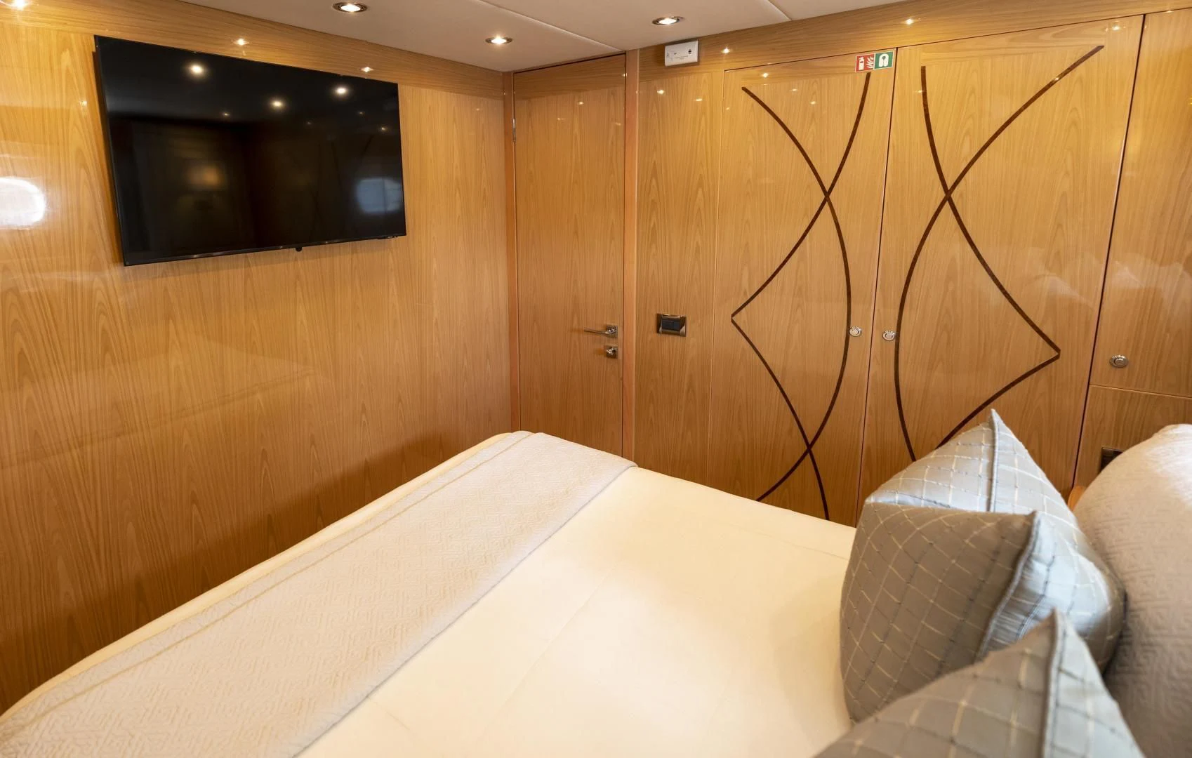 a bed in a room aboard PINGUINITO Yacht for Sale