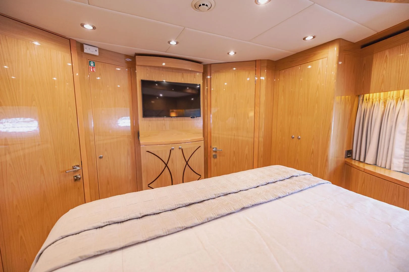 a bed in a room aboard PINGUINITO Yacht for Sale
