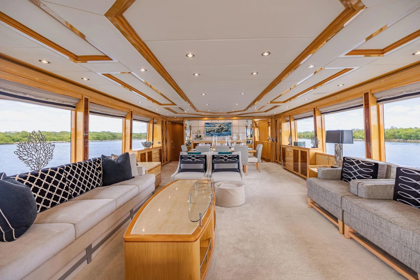 a living room with a large open window aboard PINGUINITO Yacht for Sale