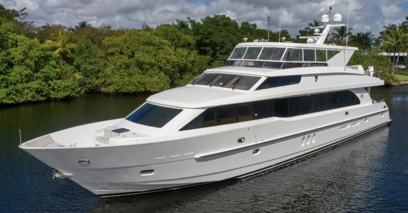 a white yacht on the water aboard PINGUINITO Yacht for Sale