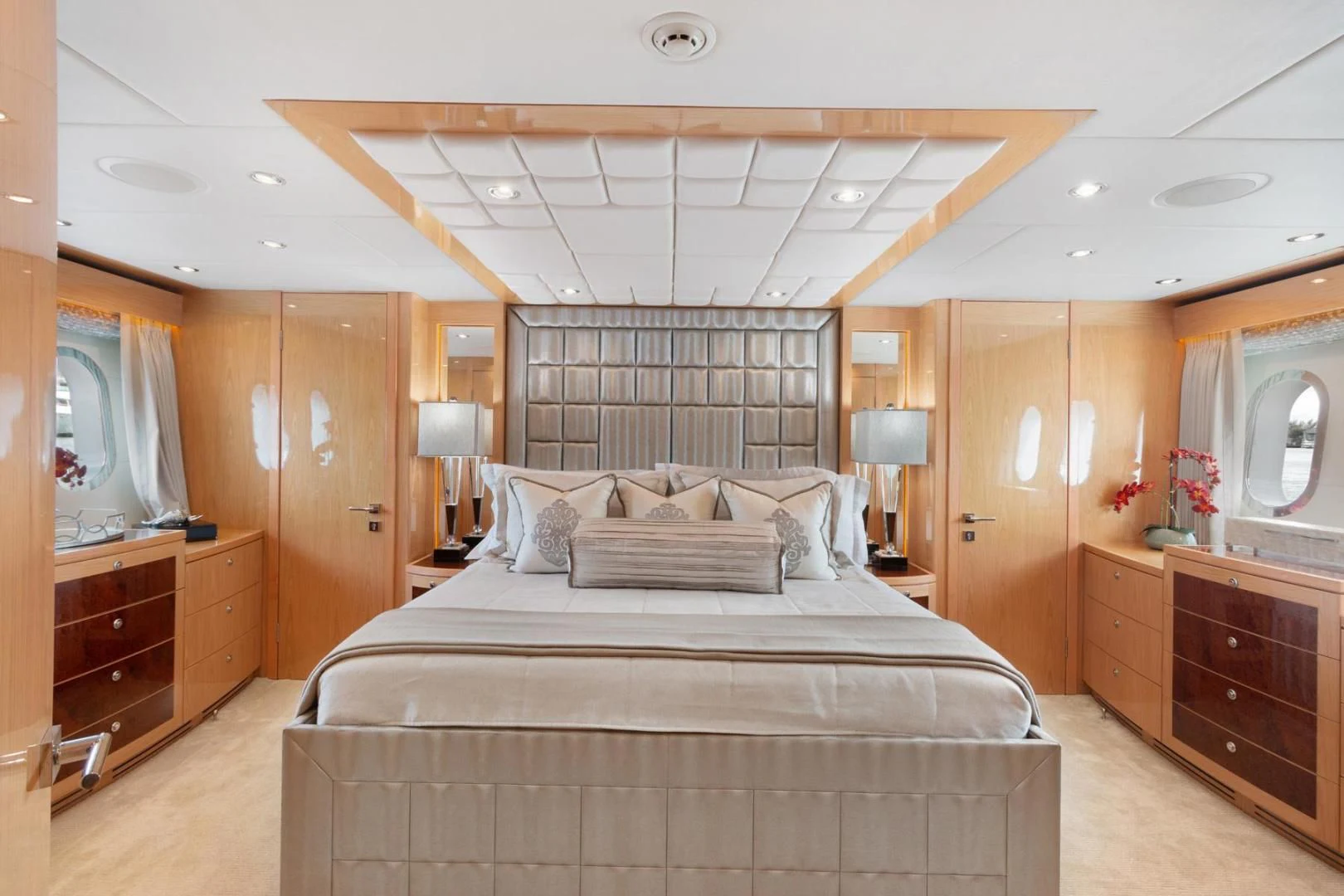 a large bedroom with a large bed aboard PINGUINITO Yacht for Sale