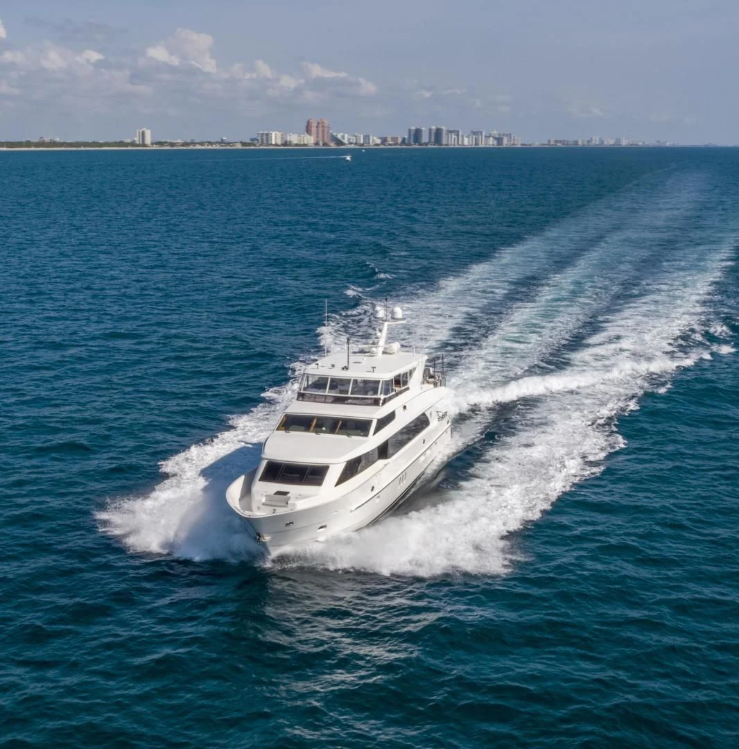 a white boat on the water aboard PINGUINITO Yacht for Sale