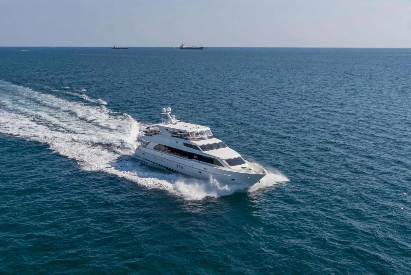 a white boat on the water aboard PINGUINITO Yacht for Sale