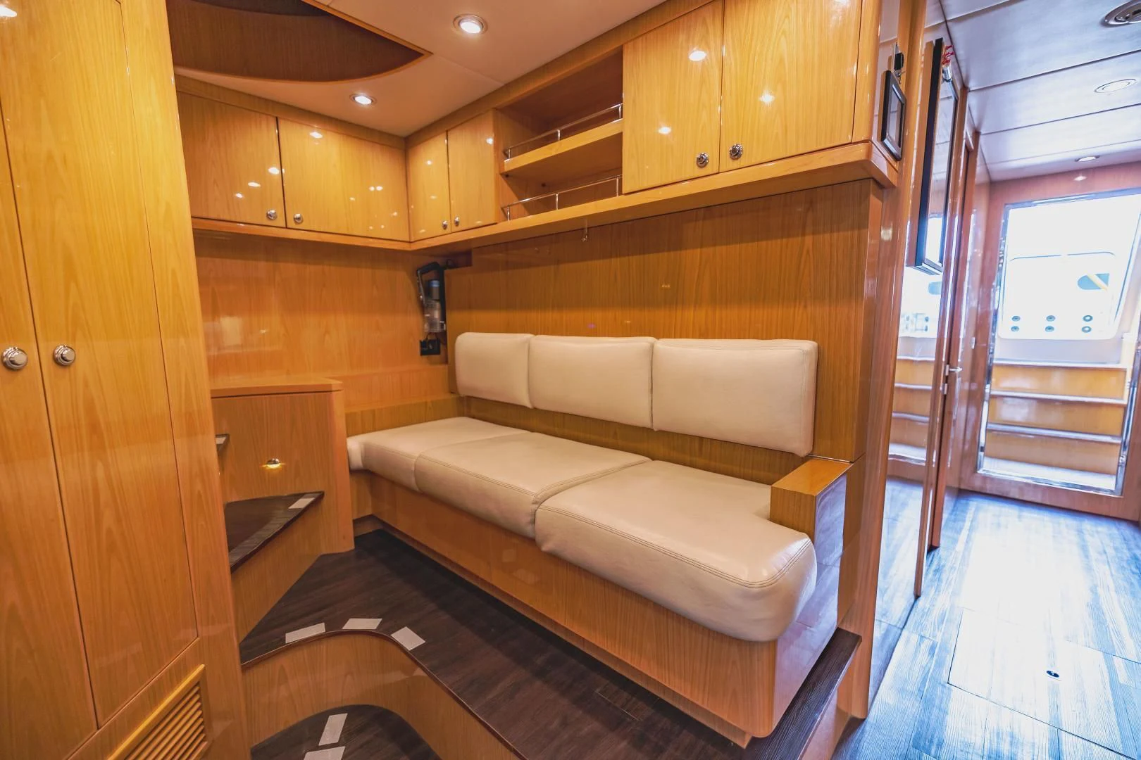 a living room with a couch aboard PINGUINITO Yacht for Sale