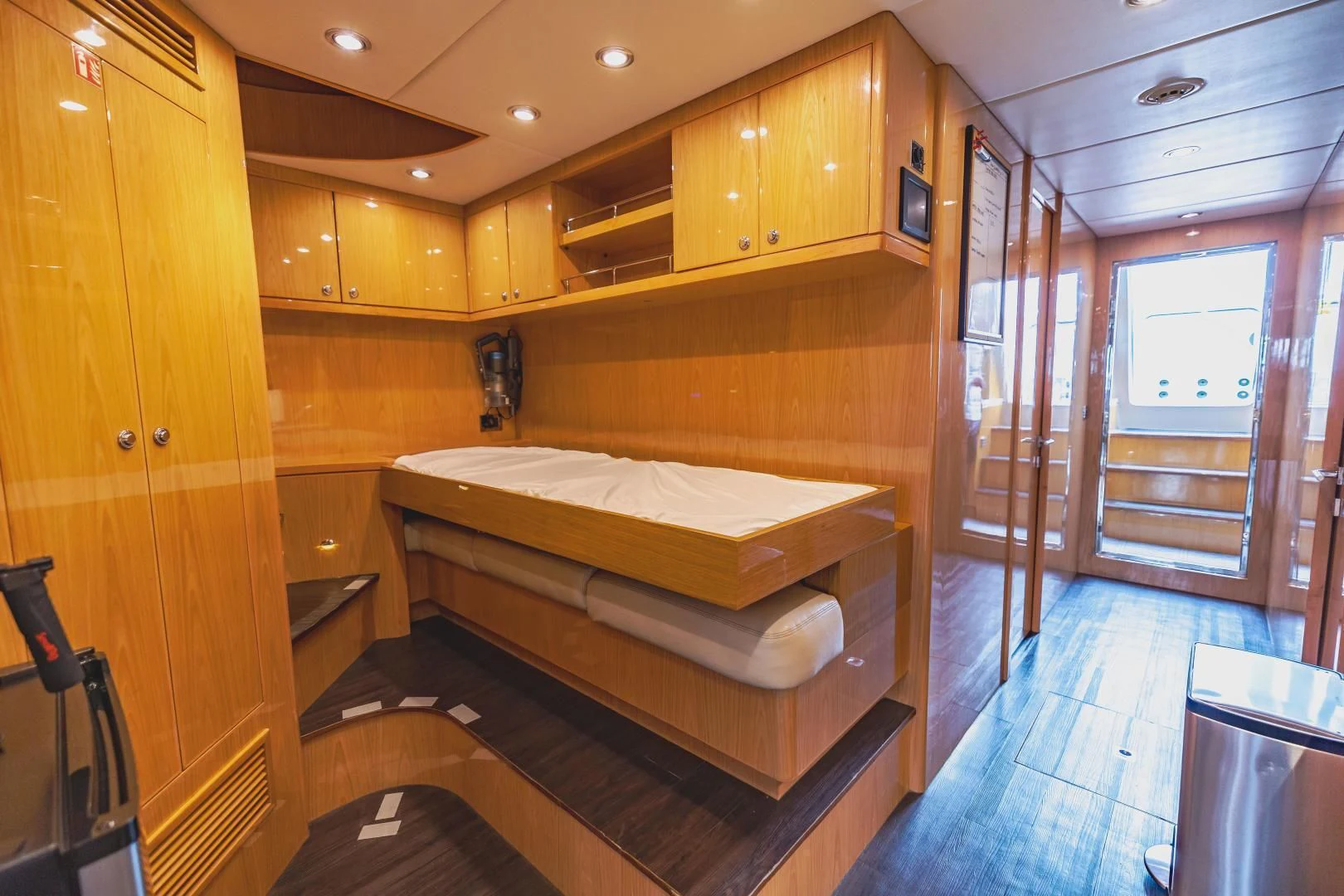a bathroom with a large bed aboard PINGUINITO Yacht for Sale