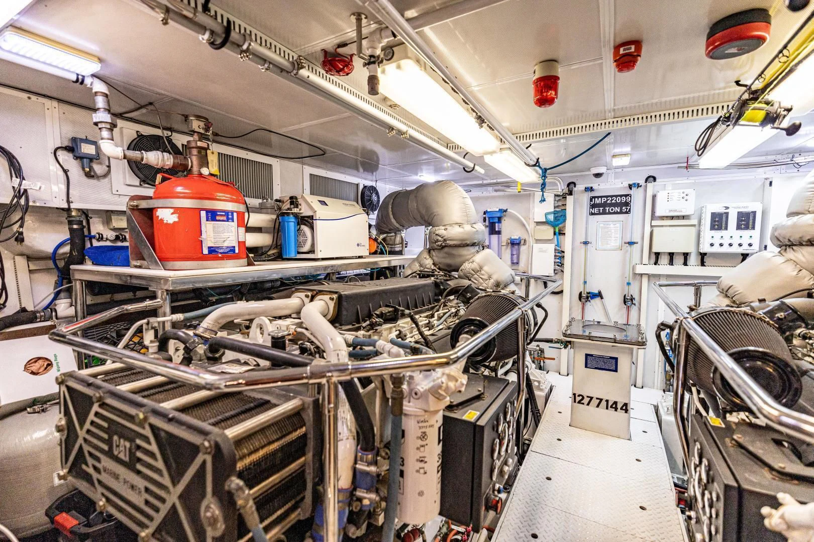 a room with machinery aboard PINGUINITO Yacht for Sale