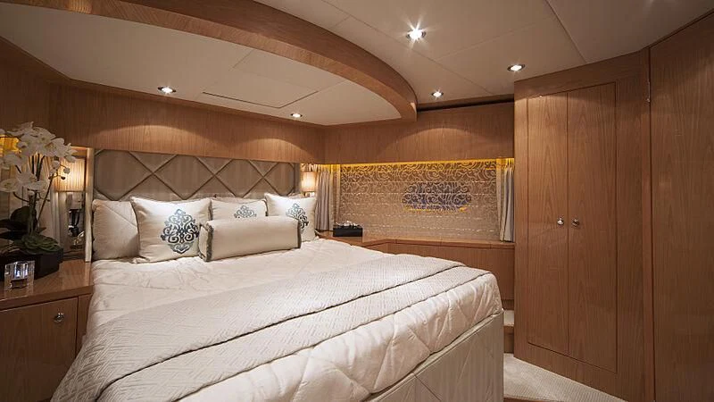 a bed in a room aboard PINGUINITO Yacht for Sale