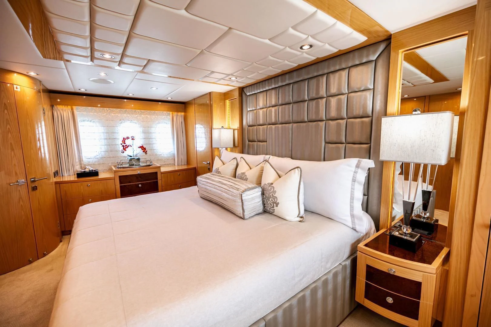 a bed in a room aboard PINGUINITO Yacht for Sale
