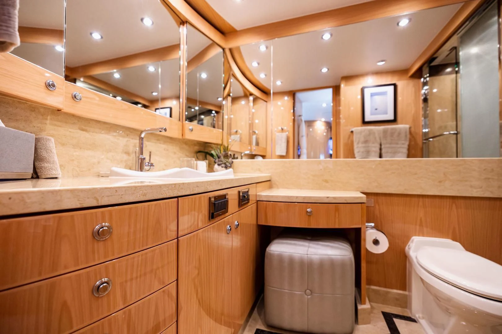 a bathroom with a sink and toilet aboard PINGUINITO Yacht for Sale