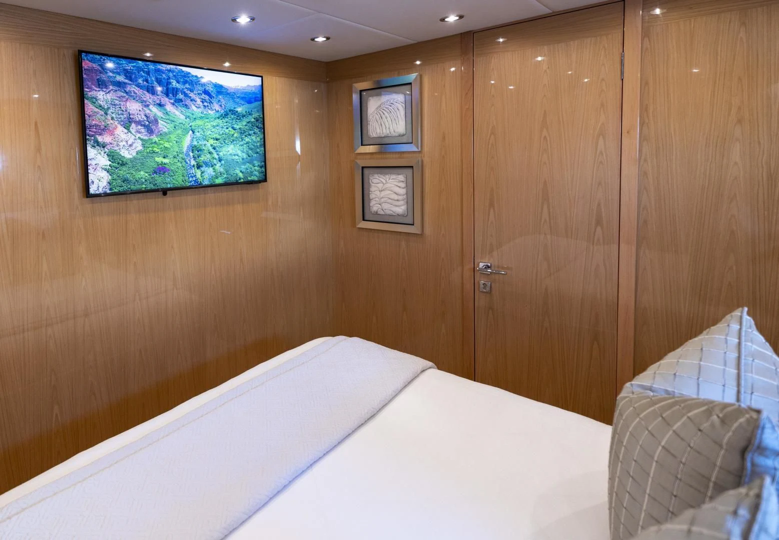 a bed in a room aboard PINGUINITO Yacht for Sale
