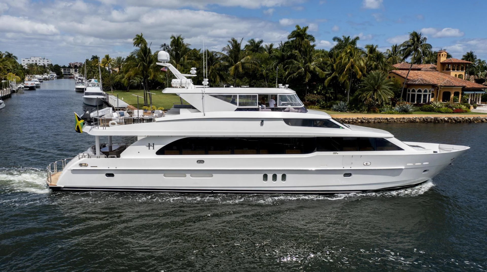 a white yacht in the water aboard PINGUINITO Yacht for Sale