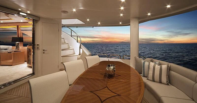 a table on a boat aboard PINGUINITO Yacht for Sale