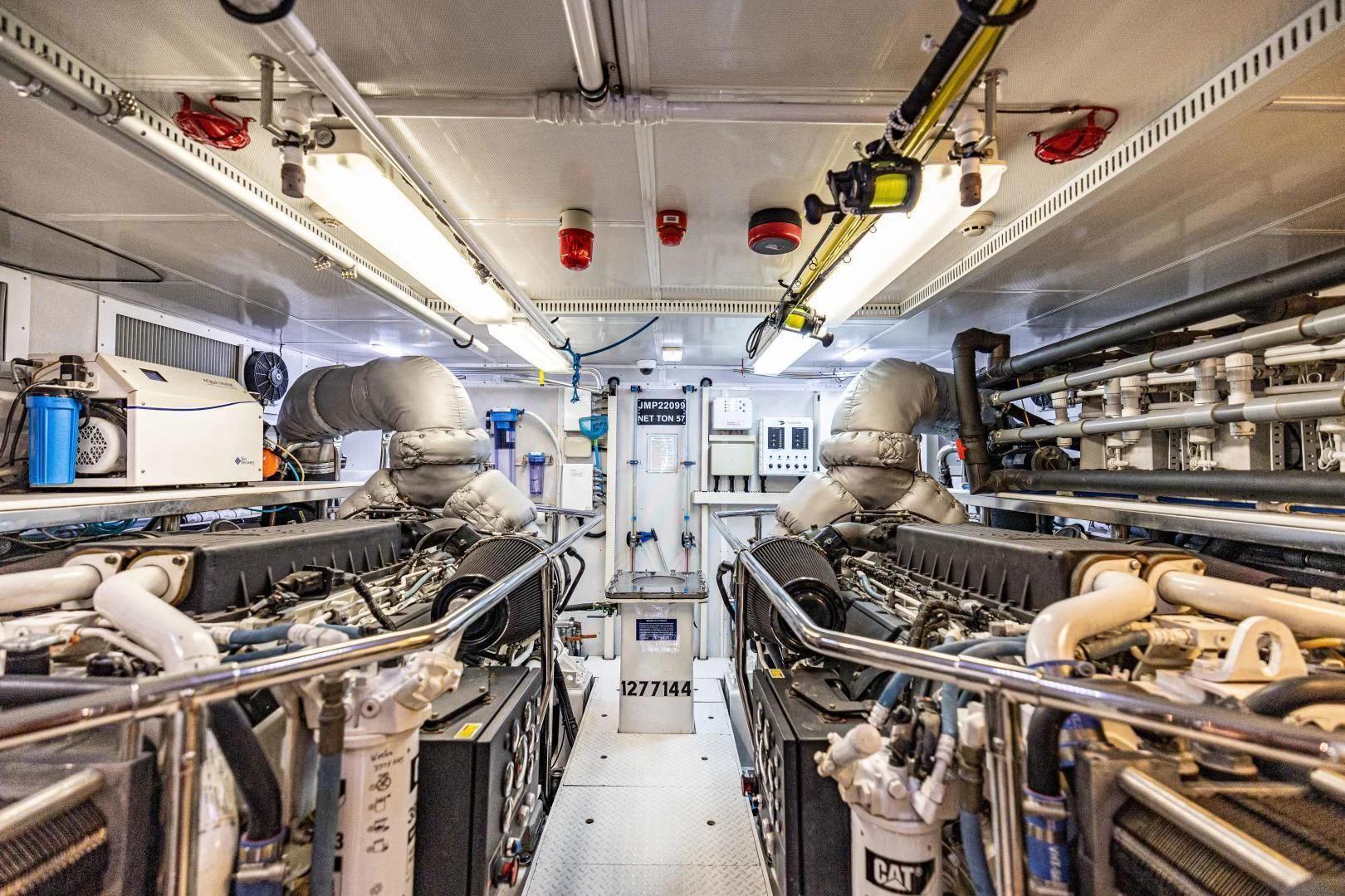 a room with machinery aboard PINGUINITO Yacht for Sale