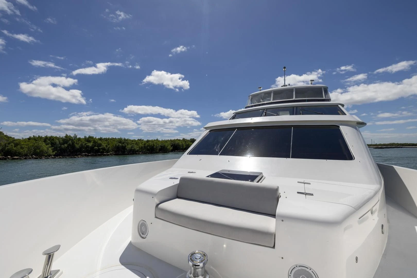 a white yacht on a lake aboard PINGUINITO Yacht for Sale