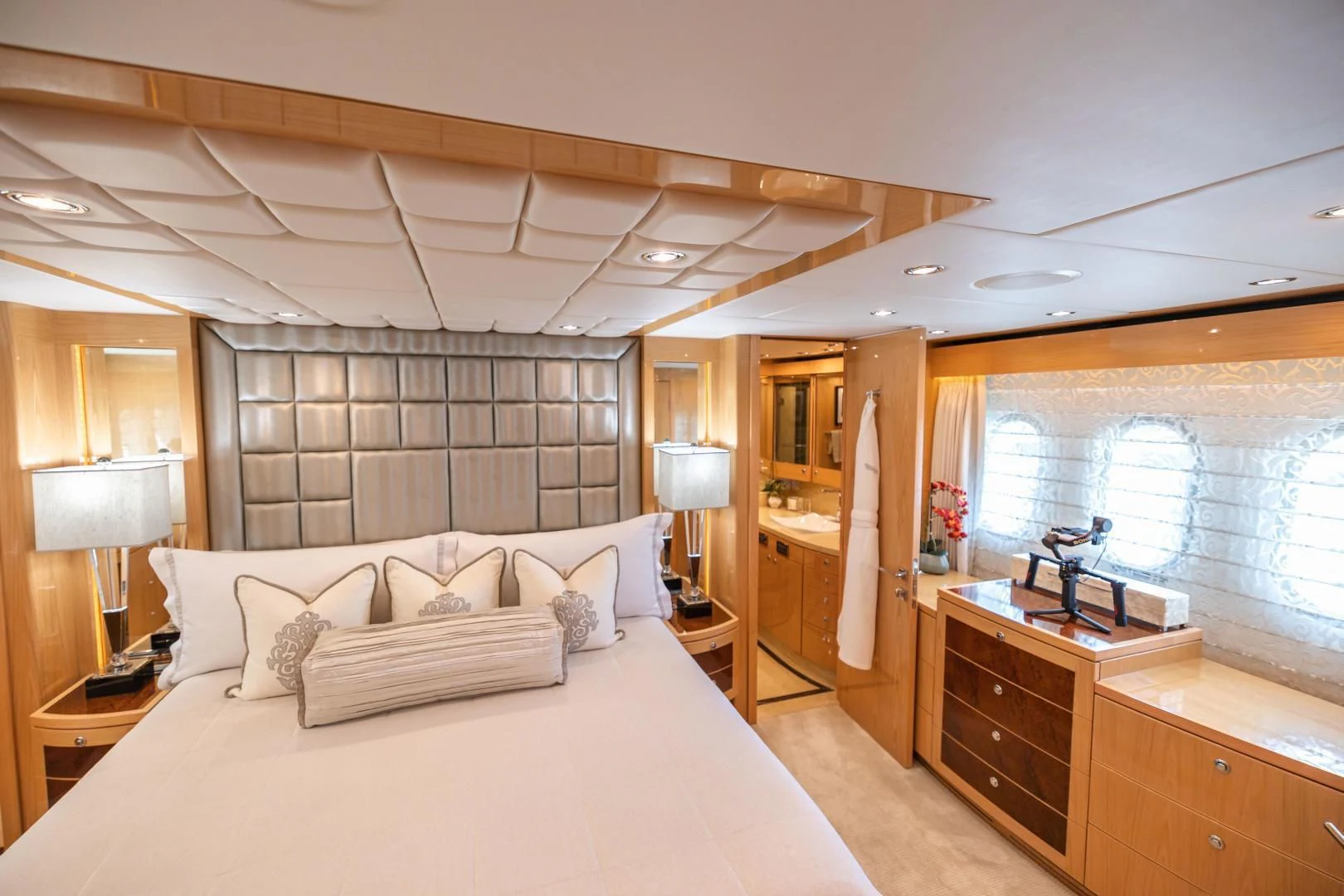 a large bedroom with a large bed aboard PINGUINITO Yacht for Sale