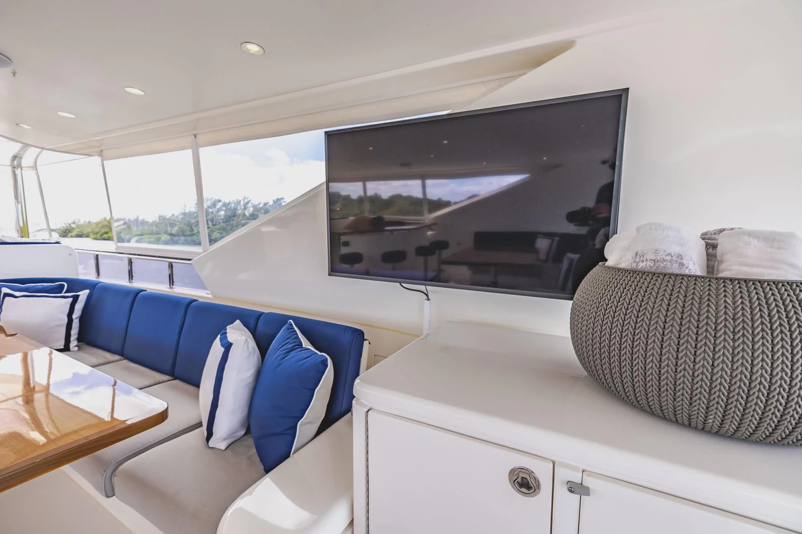 a room with a large television aboard PINGUINITO Yacht for Sale