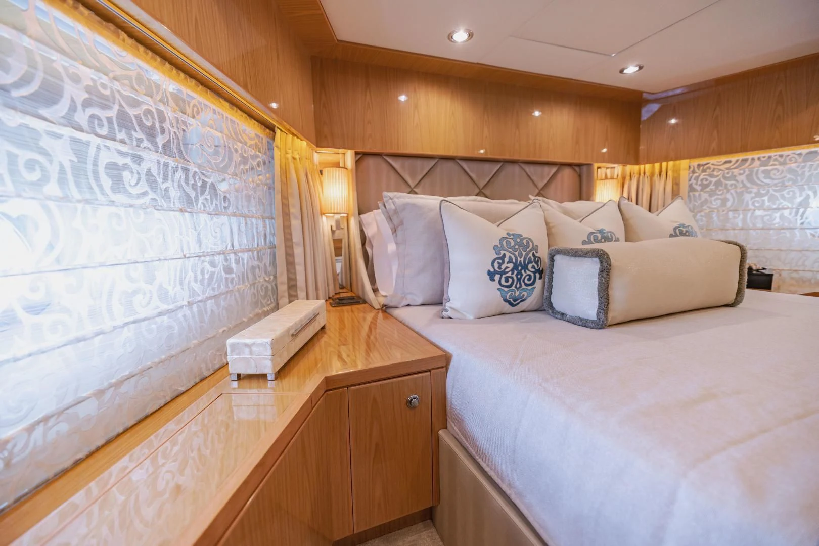 a bed with a large bed aboard PINGUINITO Yacht for Sale