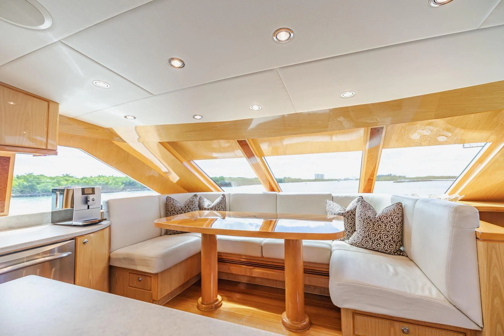a room with a couch and a table aboard PINGUINITO Yacht for Sale