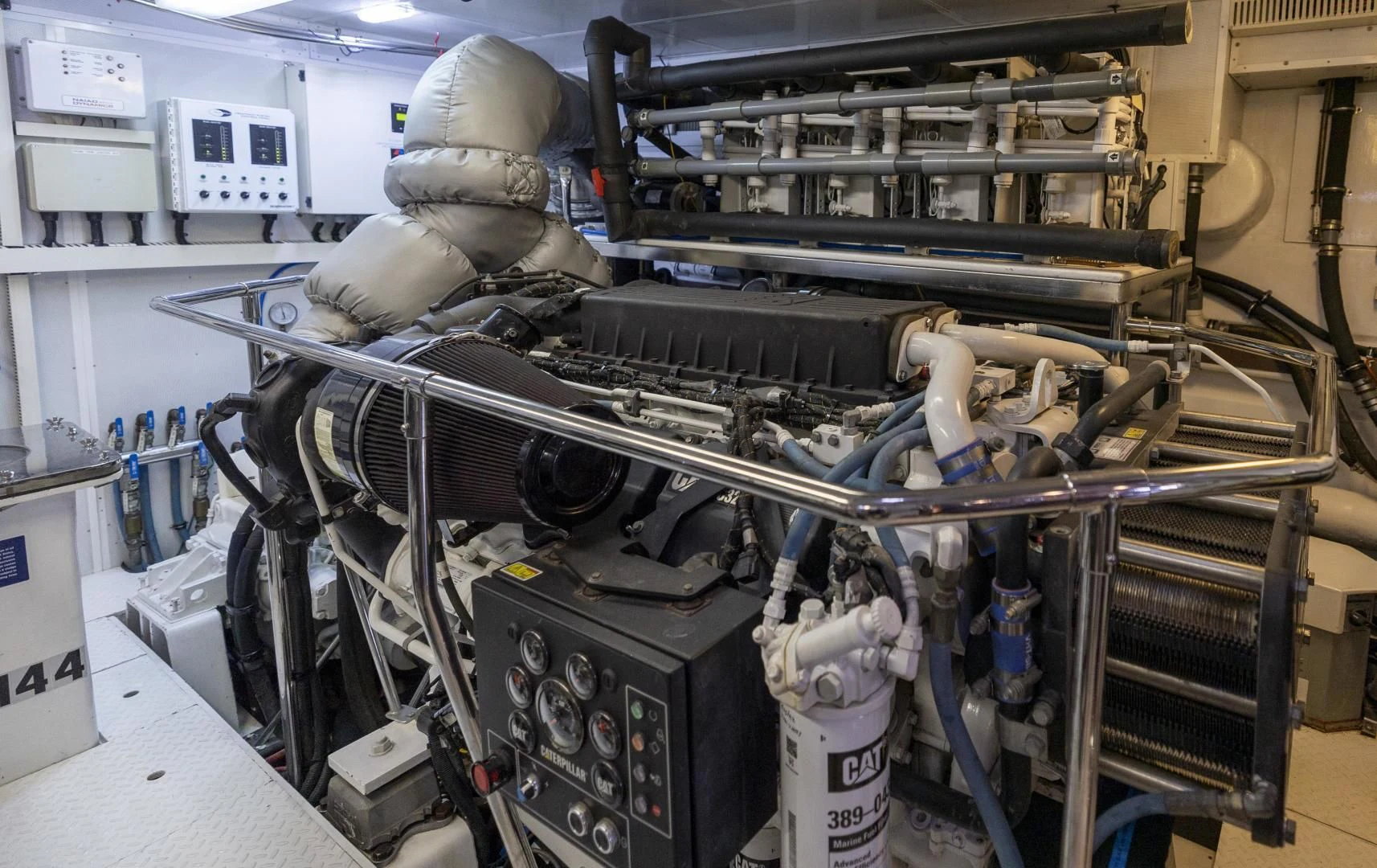 a machine with a person in it aboard PINGUINITO Yacht for Sale