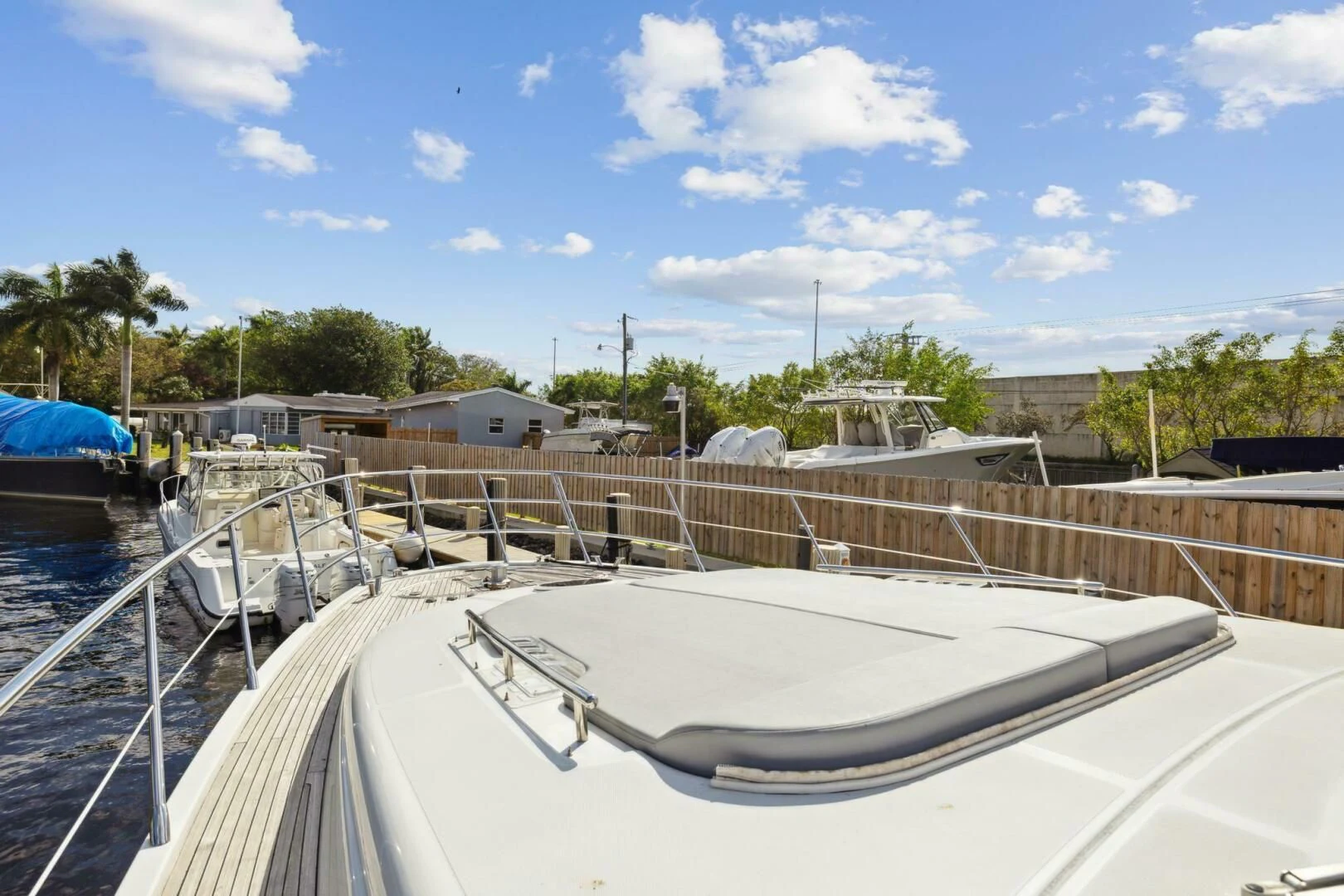 a boat in a harbor aboard SOMEWHERE I BELONG Yacht for Sale
