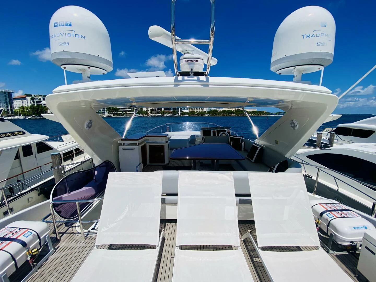 a plane parked at a dock aboard SOMEWHERE I BELONG Yacht for Sale
