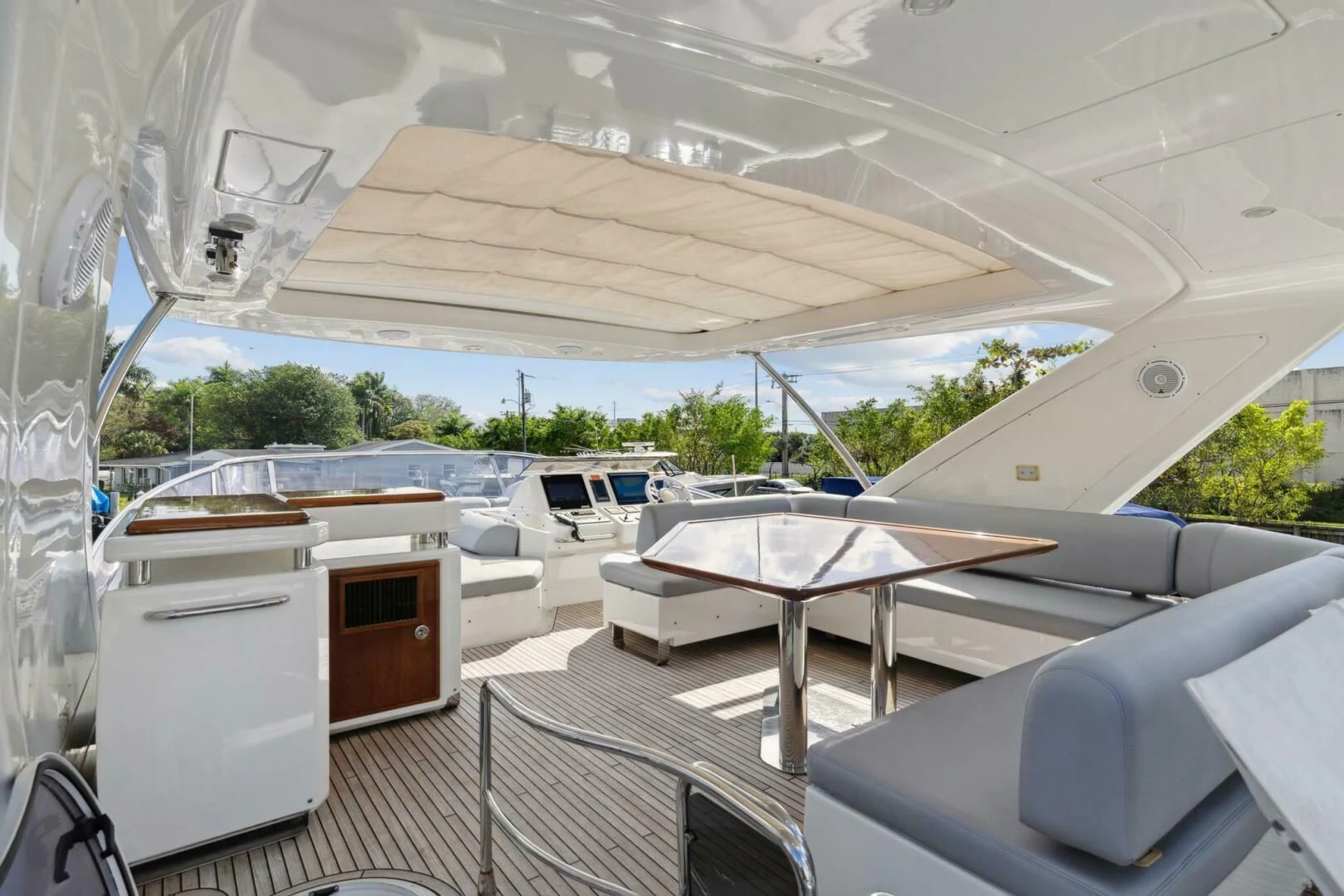 a room with a table and chairs aboard SOMEWHERE I BELONG Yacht for Sale