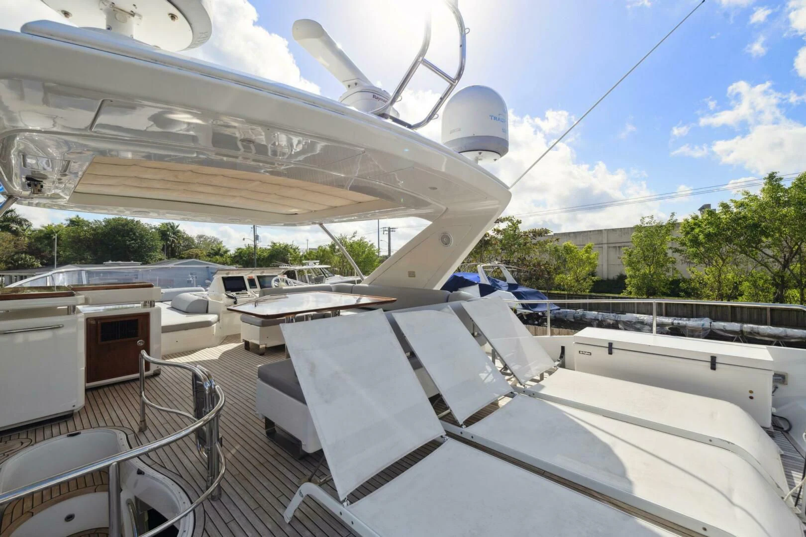 a large white satellite dish on a roof aboard SOMEWHERE I BELONG Yacht for Sale