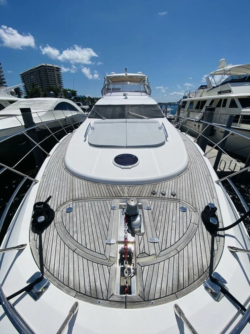 a large white ship aboard SOMEWHERE I BELONG Yacht for Sale