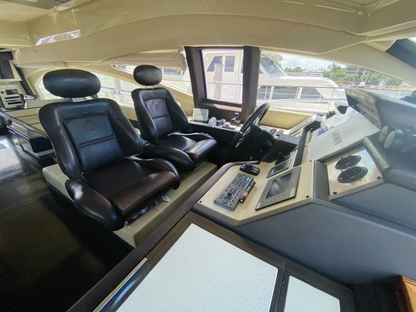 an airplane cockpit with many seats aboard SOMEWHERE I BELONG Yacht for Sale