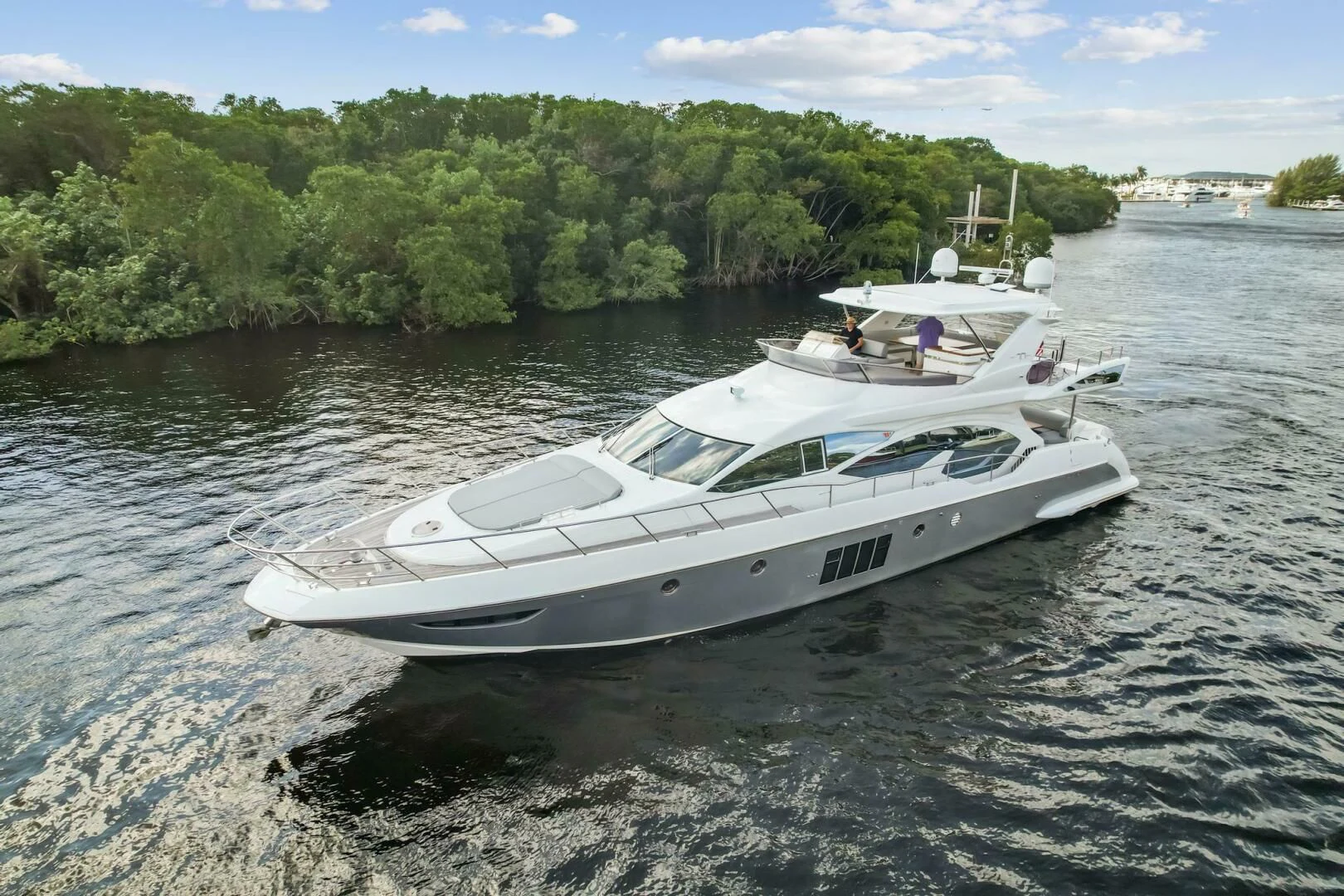 a couple of boats in the water aboard SOMEWHERE I BELONG Yacht for Sale