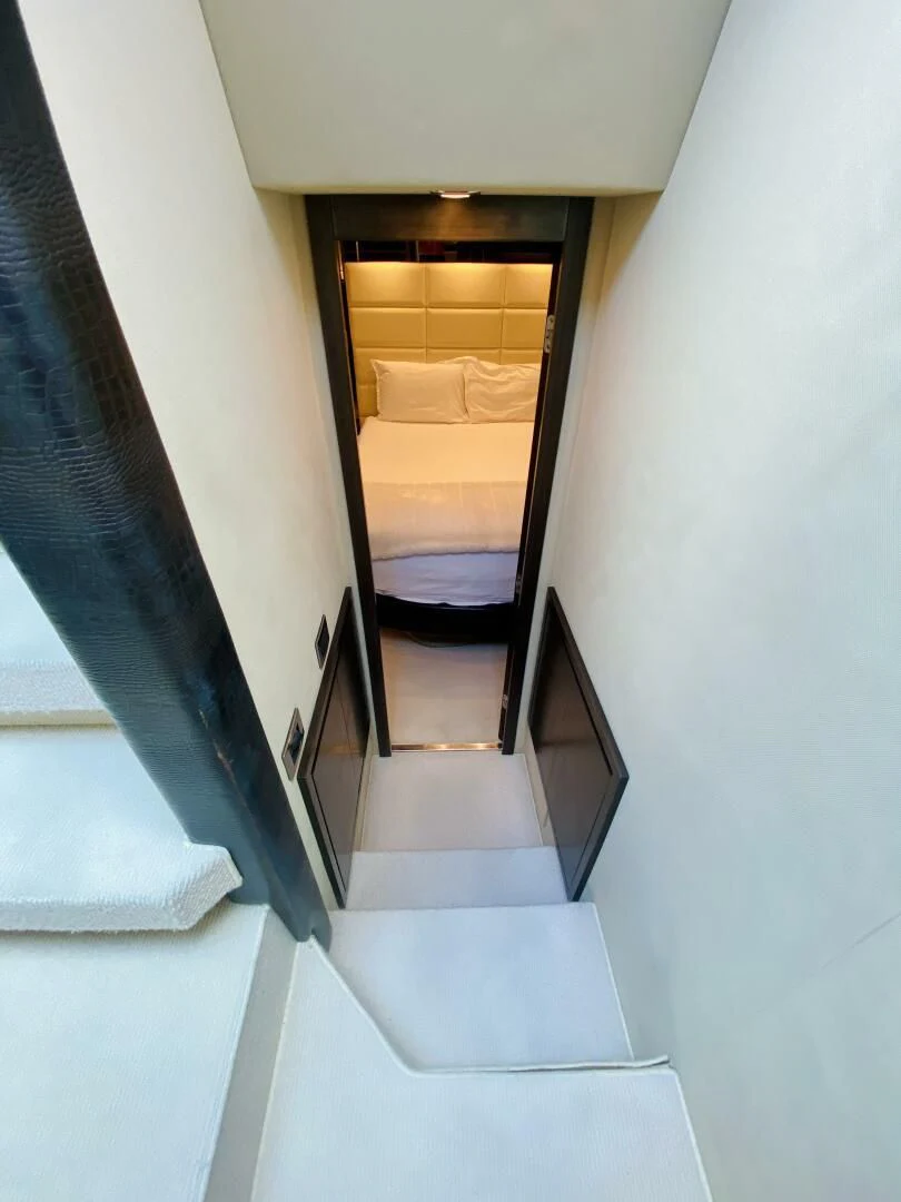 a staircase with a wood frame aboard SOMEWHERE I BELONG Yacht for Sale