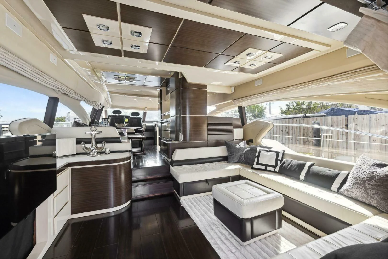 a room with a couch and a table aboard SOMEWHERE I BELONG Yacht for Sale