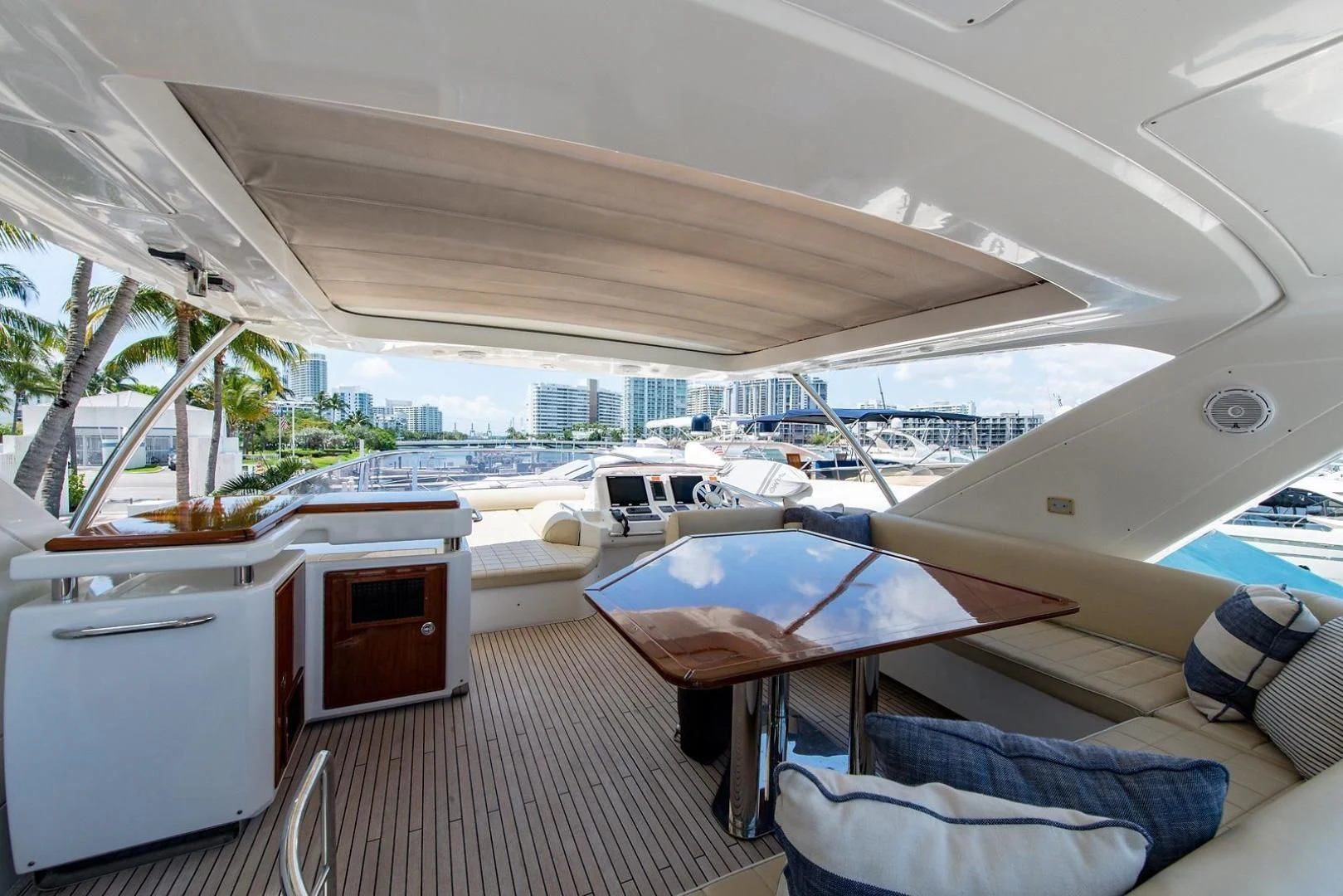 a room with a table and chairs aboard SOMEWHERE I BELONG Yacht for Sale