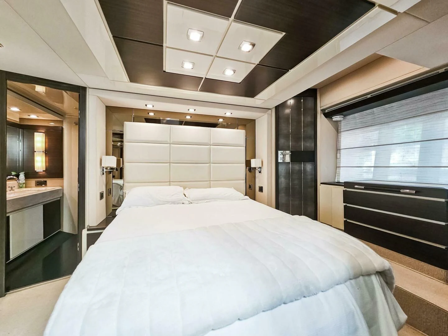 a large bed in a room aboard SOMEWHERE I BELONG Yacht for Sale