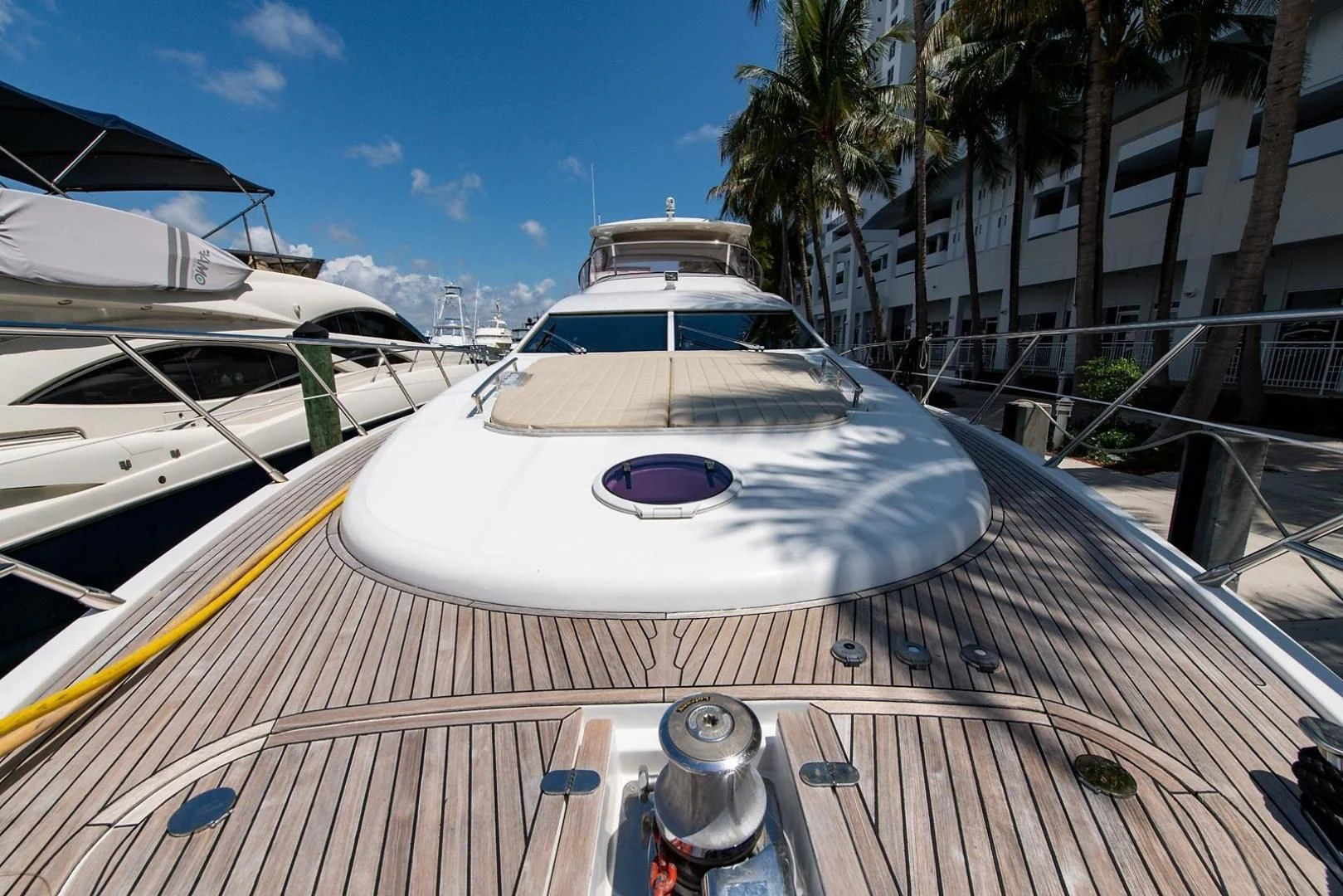 a boat on a deck aboard SOMEWHERE I BELONG Yacht for Sale